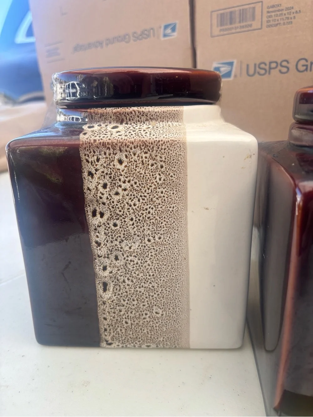 Pier 1 Two-Tone Brown and White Ceramic Canister Pair